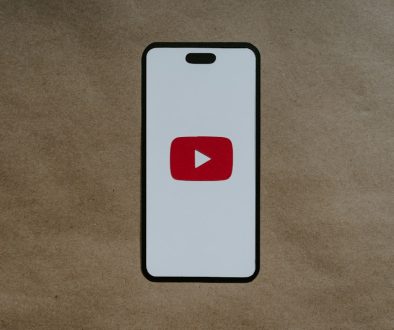 a white phone with a red youtube logo on it youtube full screen, user can’t scroll, youtube ui bug a white phone with a red youtube logo on it youtube full screen, user can’t scroll, youtube ui bug