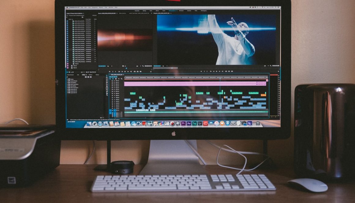 black Apple iMac besides white Apple Magic mouse and keyboard premiere pro, media cache, software settings black Apple iMac besides white Apple Magic mouse and keyboard premiere pro, media cache, software settings