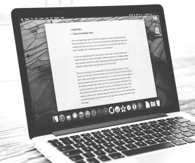 Laptop displays a document, possibly a letter. content review, human editor, AI generated article