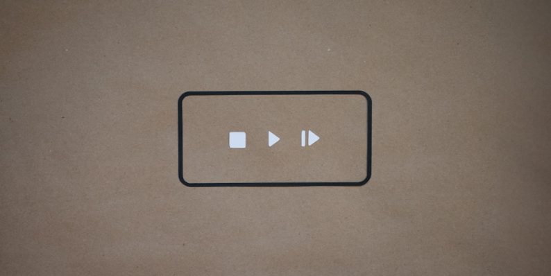 a black and white button on a brown background bilibili user interface anime videos comments