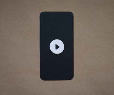a black device with a play button on it buffering video frustrated user wifi