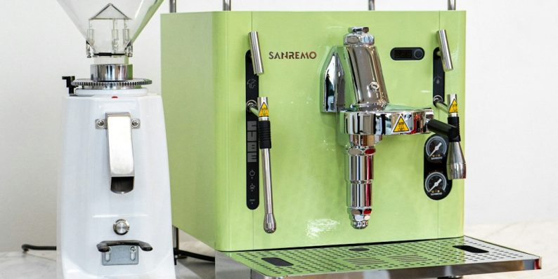 a green machine and a white machine on a table coffee equipment, french press, espresso machine, v60 a green machine and a white machine on a table coffee equipment, french press, espresso machine, v60