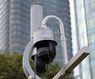 a security camera attached to a metal pole gunshot detection, urban surveillance, acoustic sensors a security camera attached to a metal pole gunshot detection, urban surveillance, acoustic sensors