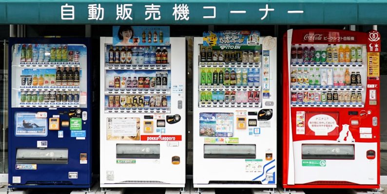 four white, red, and blue vending machines japanese language app, jlpt practice, smartphone screens
