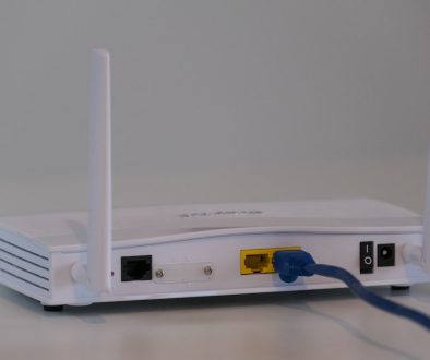 white router on white table wifi router modem ethernet cable streaming fix