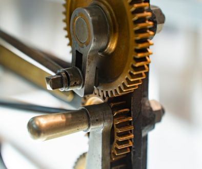 Gears interlock, showing intricate mechanical design. cnc machine, acrylic part, spindle, cutting