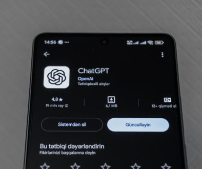 Smartphone screen displaying chatgpt app details. chatgpt app, user chatting, glowing interface