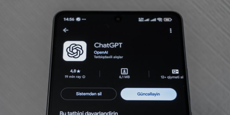 Smartphone screen displaying chatgpt app details. chatgpt app, user chatting, glowing interface