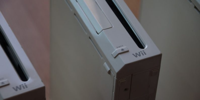 two nintendo wii game consoles side by side wii console, wii settings menu, homebrew channel