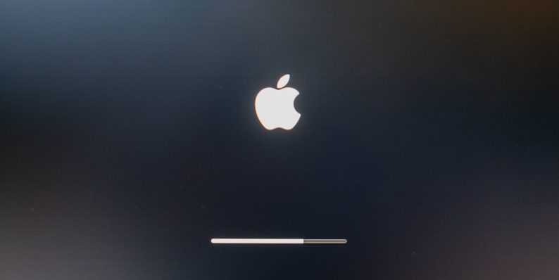 an apple logo is shown on a black background mac app trash delete